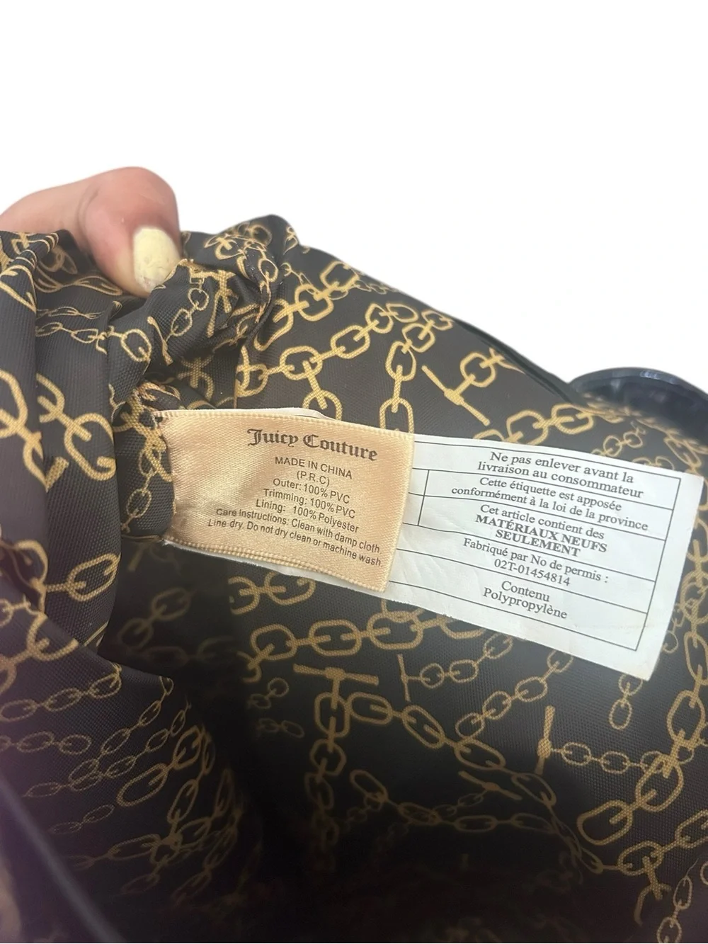 Juicy Couture Vibrant Pink Drawstring Backpack with Gold Accents